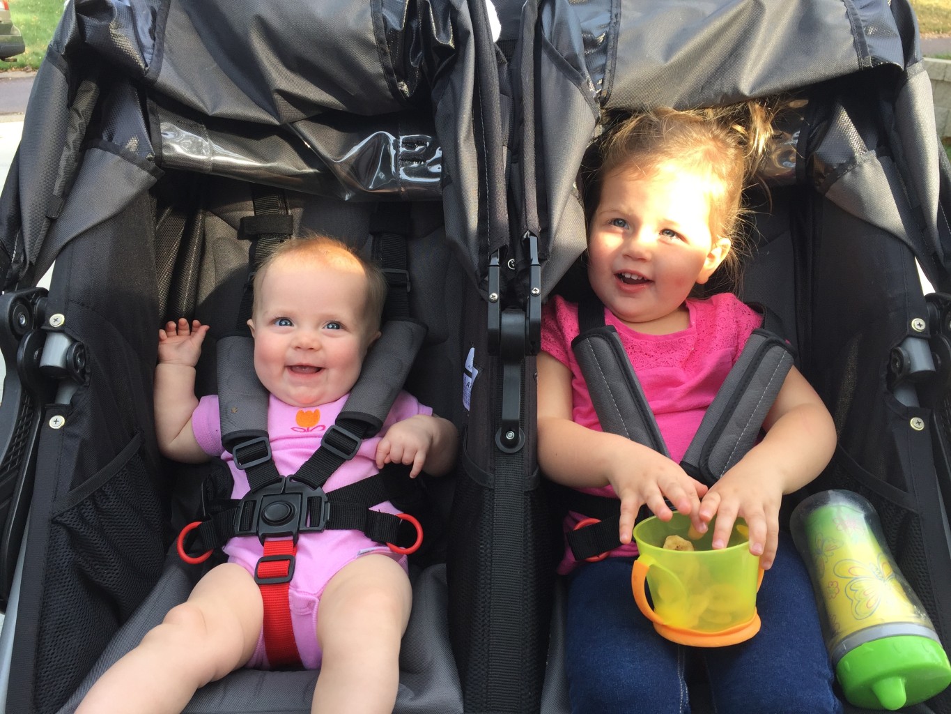 Campbell's now old enough to sit in the stroller with her big sister!
